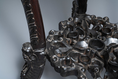Two reticulated Chinese carved wooden stands, 19/20th C.