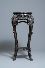 Two reticulated Chinese carved wooden stands, 19/20th C.