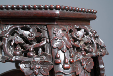 Two reticulated Chinese carved wooden stands, 19/20th C.