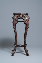 Two reticulated Chinese carved wooden stands, 19/20th C.