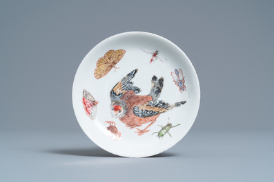 A Chinese famille rose 'bird and insects' cup and saucer, Yongzheng