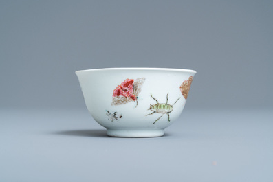 A Chinese famille rose 'bird and insects' cup and saucer, Yongzheng