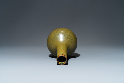 A Chinese monochrome teadust-glazed bottle vase, 19th C.