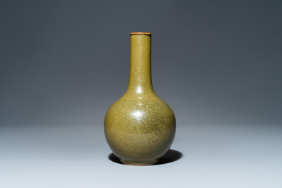 A Chinese monochrome teadust-glazed bottle vase, 19th C.