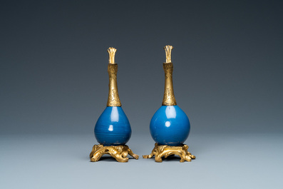 Two Chinese monochrome blue vases mounted as ewers with gilt bronze, Kangxi and 19th C.