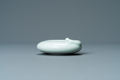A Chinese celadon-glazed 'dragon' brush washer, Qianlong mark, 19/20th C.
