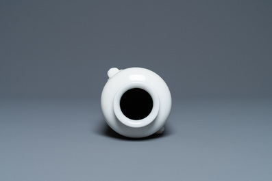 A Chinese Dehua blanc de Chine rouleau vase, Kangxi