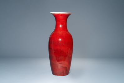 A Chinese monochrome sang de boeuf bottle vase, 19/20th C.