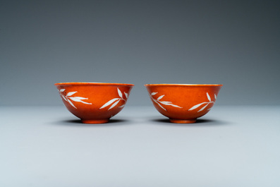 A pair of Chinese 'bamboo' coral red-ground bowls, Xuantong mark, Republic