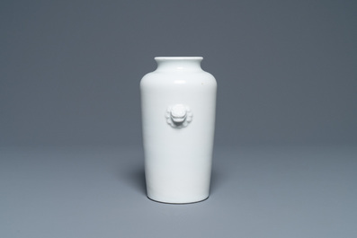 A Chinese Dehua blanc de Chine rouleau vase, Kangxi