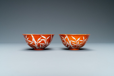 A pair of Chinese 'bamboo' coral red-ground bowls, Xuantong mark, Republic