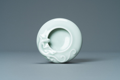 A Chinese celadon-glazed 'dragon' brush washer, Qianlong mark, 19/20th C.