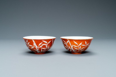 A pair of Chinese 'bamboo' coral red-ground bowls, Xuantong mark, Republic