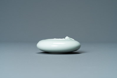 A Chinese celadon-glazed 'dragon' brush washer, Qianlong mark, 19/20th C.