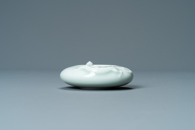 A Chinese celadon-glazed 'dragon' brush washer, Qianlong mark, 19/20th C.