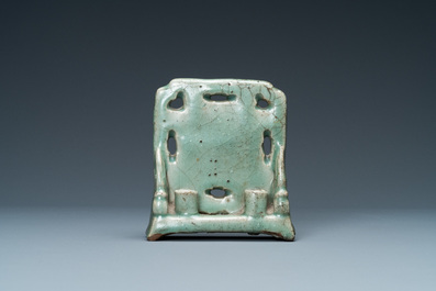 A Chinese Longquan celadon table screen with joss stick holders, Ming