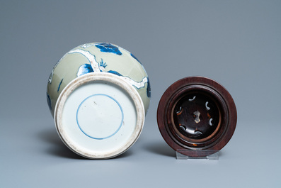 A Chinese blue, white and copper-red celadon-ground 'birds and deer' vase, Kangxi