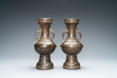 A pair of Chinese bronze vases, Yuan