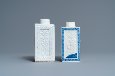 Two Chinese blanc de Chine and blue and white relief-moulded tea caddies, 19th C.
