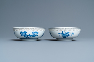 A pair of Chinese blue and white 'immortals' bowls, Kangxi