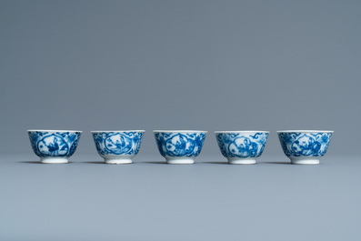 Five Chinese blue and white cups and saucers, Kangxi