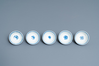 Five Chinese blue and white cups and saucers, Kangxi