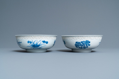 A pair of Chinese blue and white 'immortals' bowls, Kangxi