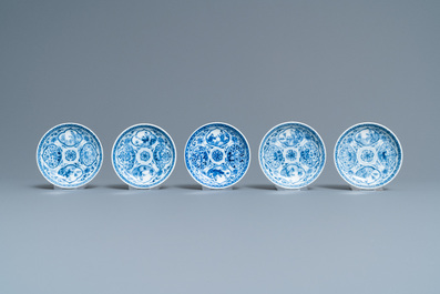 Five Chinese blue and white cups and saucers, Kangxi