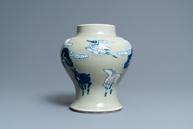 A Chinese blue, white and copper-red celadon-ground 'birds and deer' vase, Kangxi