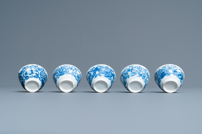 Five Chinese blue and white cups and saucers, Kangxi
