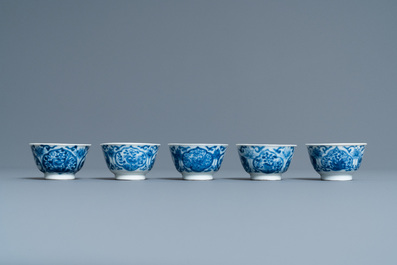 Five Chinese blue and white cups and saucers, Kangxi