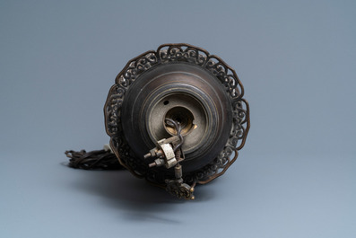 Un vase en biscuit ajour&eacute; &agrave; d&eacute;cor de lions bouddhistes mont&eacute; en lampe, Chine, 19&egrave;me