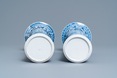 A Chinese blue and white five-piece garniture with floral design, 19th C.