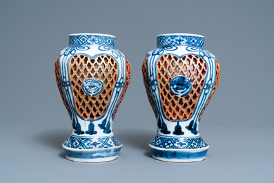 A pair of Japanese Arita blue and white reticulated vases, Edo, 17/18th C.