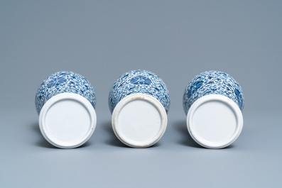 A Chinese blue and white five-piece garniture with floral design, 19th C.