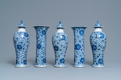 A Chinese blue and white five-piece garniture with floral design, 19th C.