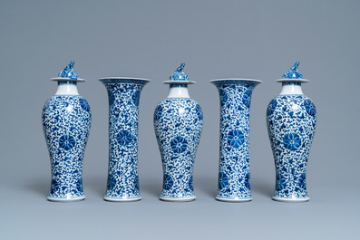 A Chinese blue and white five-piece garniture with floral design, 19th C.