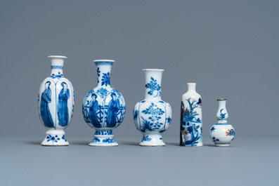 Five Chinese mostly blue and white vases, Kangxi