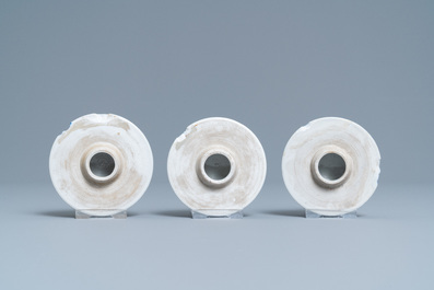A Chinese blue and white five-piece garniture with floral design, 19th C.