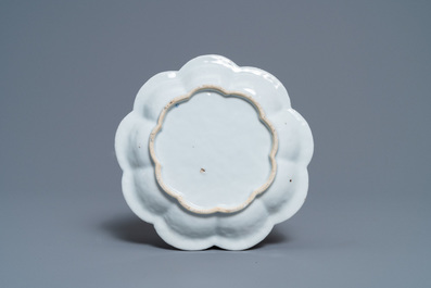 A Chinese famille rose relief-decorated teapot on stand, Yongzheng