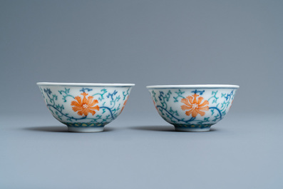 A pair of Chinese doucai bowls, four-character mark, 20th C.