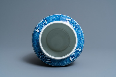 A Chinese blue and white 'birds and butterflies' vase, seal mark, 19th C.