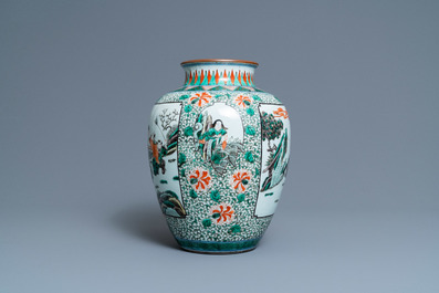 A Chinese famille verte 'playing boys' vase, 19th C.