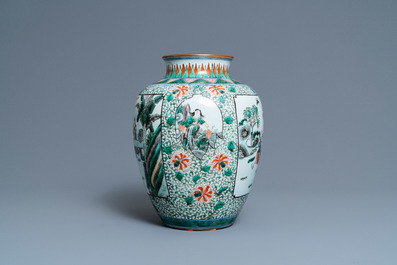 A Chinese famille verte 'playing boys' vase, 19th C.