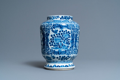 A Chinese blue and white 'birds and butterflies' vase, seal mark, 19th C.