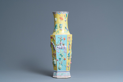 A Chinese famille rose vase with applied 'antiquities' design, 19th C.