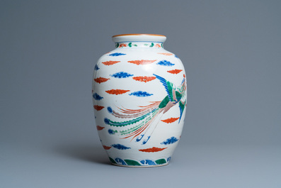 A Chinese wucai 'dragon and phoenix' vase, 19th C.