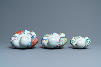 Five Chinese famille rose and white figures of Buddha, seal marks, 19/20th C.