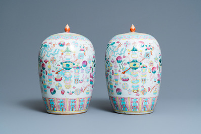 A pair of Chinese famille rose 'antiquities' jars and covers, 19th C.