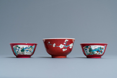 Three Chinese famille rose ruby-ground cups and saucers, Yongzheng